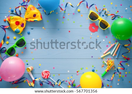 Colorful frame with party items on blue background. Happy birthday concept