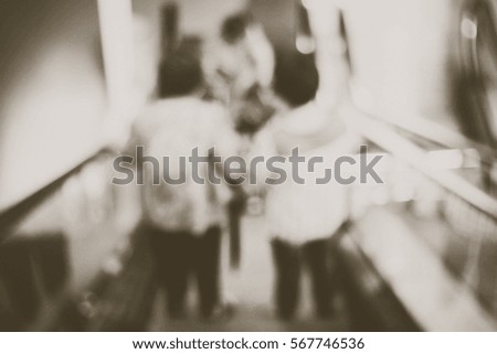 Blurred  background abstract and can be illustration to article of people on escalator