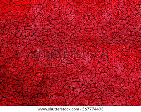 Texture black cracks on a red background