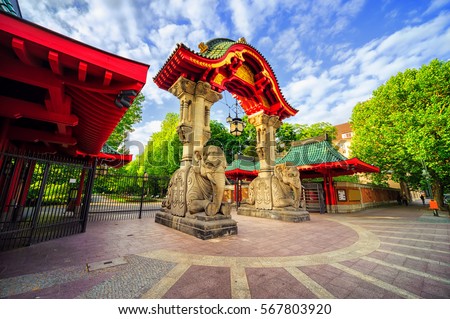 Stone elephants and the arch on the entrance to the Berlin Zoological Garden, Germany, the biggest zoo in the world by amount of species Royalty-Free Stock Photo #567803920