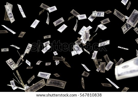 hundred dollars banknotes fly on black background. money rain concept