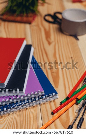 business cards, notes, stickers, sunglasses, pens, pencils , scissors