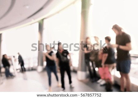 Blurred silhouette  people with crown in shopping mall early opened with new products