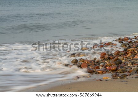 stones and sea wave