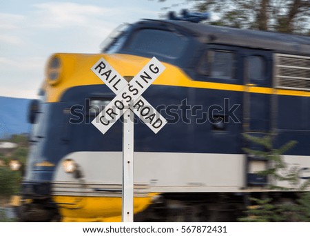 Diesel engine with railroad crossing sign