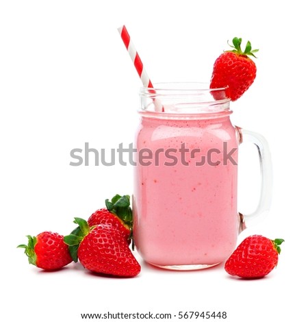 Pink strawberry smoothie in a mason jar glass with straw and scattered berries isolated on white Royalty-Free Stock Photo #567945448