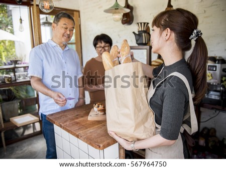 Small bakery business buying customer