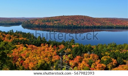 Rock Lake is one of the beautiful lakes inside Algonquin Provincial Park in Huntsville, Ontario, Canada.  It also has one of the best lookout trail for the best view during Autumn season.