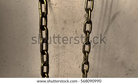 The brass metal chain.