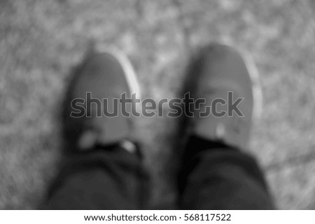 Blurred abstract background and can be illustration to article of Selfie of feet in red shoes