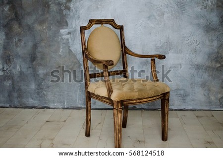 chair on a background of gray wall
