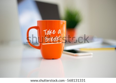 TAKE A BREAK Coffee Cup Concept Royalty-Free Stock Photo #568131331