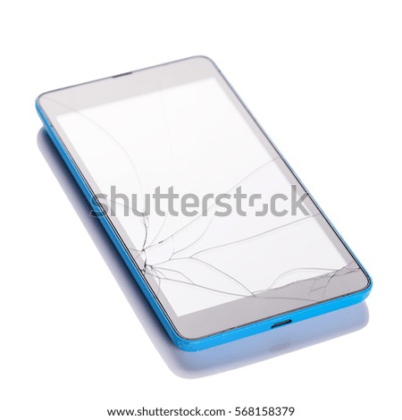 Broken screen on smartphone, closeup on white background.