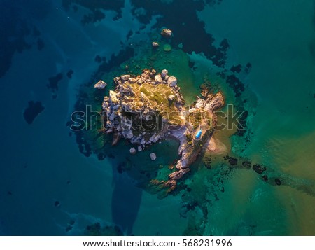 Kastri island of Kefalos at Kos island of Greece. Top down view, aerial shot.