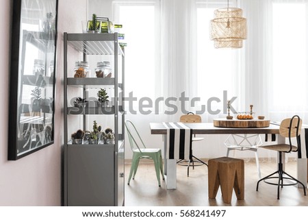 Bright area with dining table and rack