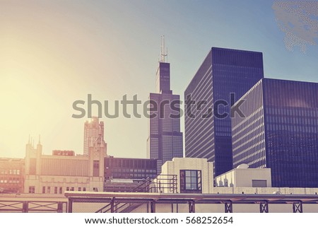 Color toned picture of Chicago downtown at sunset, Illinois, USA.