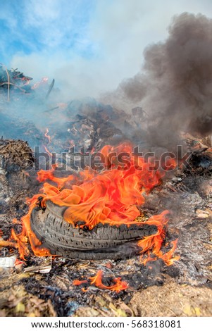Close-up of tire burning on road