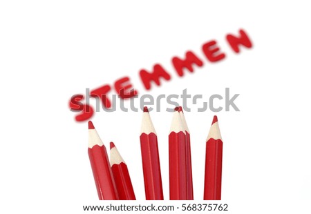 Red pencils and the word stemmen which means voting in dutch 