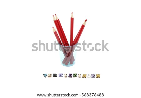 Red pencils and the word verkiezingen which means elections in dutch 