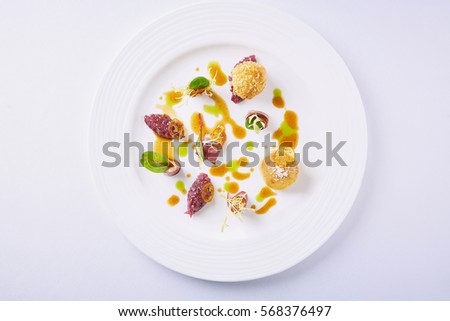 Beautiful and tasty food on a plate Royalty-Free Stock Photo #568376497