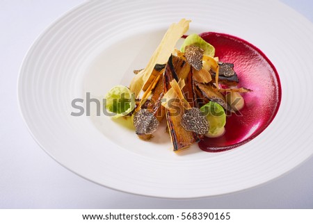 Beautiful and tasty vegetarian food on a plate Royalty-Free Stock Photo #568390165