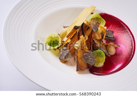 Beautiful and tasty vegetarian food on a plate Royalty-Free Stock Photo #568390243