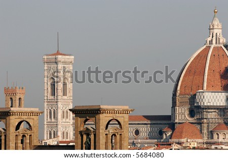 Duomo cathedral protruding over the rooftops of Florence. Taken in early morning.