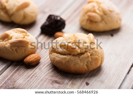 Freshly baked biscuit with almond and prunes