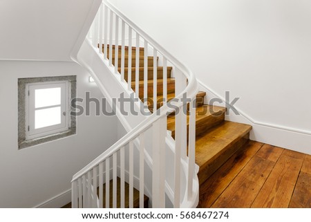 Beautiful Staircase With Hardwood Floor Royalty-Free Stock Photo #568467274