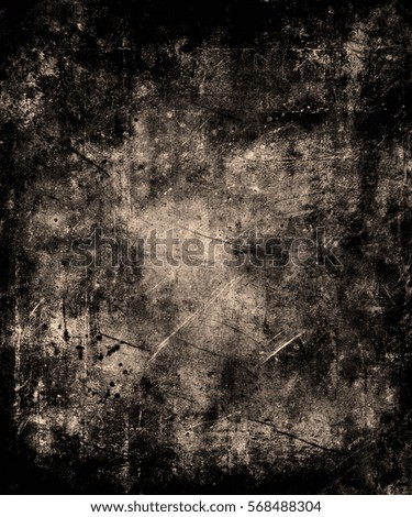 Grunge metal scratched texture background with black frame.