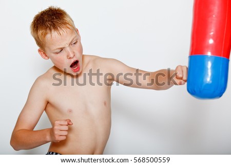 Young boy practicing boxing