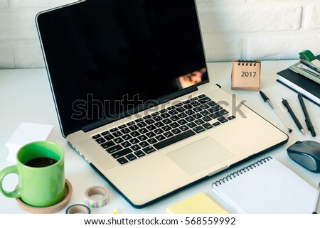 Workspace with laptop notebook stick notes scotch coffee cup, white background. Template mock up place for text Office table desk. Freelancer cozy working place area. Working at home or online concept