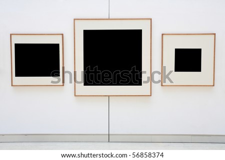 frames on  white wall in art museum