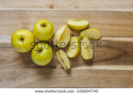 Apples on a wood background