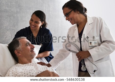 Doctor and nurse with patient
