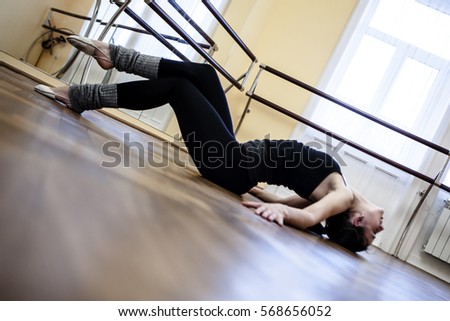 Flexible gymnast doing exercise