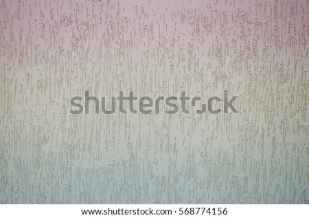 Concrete wall texture with colored plaster. Beautiful design facade painted plaster walls with small pits of various shapes. The texture for the walls in the interior or exterior