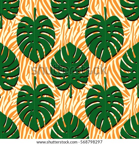 Tropical monstera leaves seamless pattern on orange zebra background. Palm leaves background. Trendy Jungle illustration. Fashion design for textile, wallpaper, fabric, decor