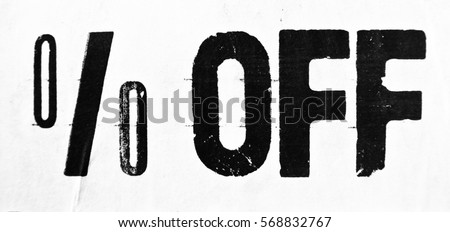 Photograph of letterpress sign offering discount or percentage off