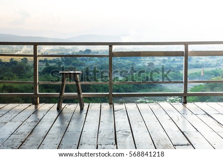 Ancient wooden chair on the balcony.