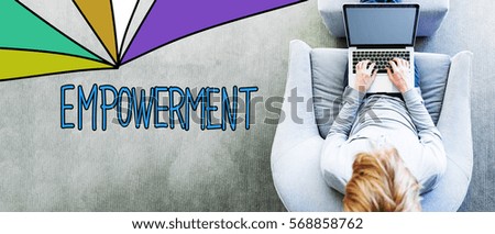 Empowerment text with man using a laptop