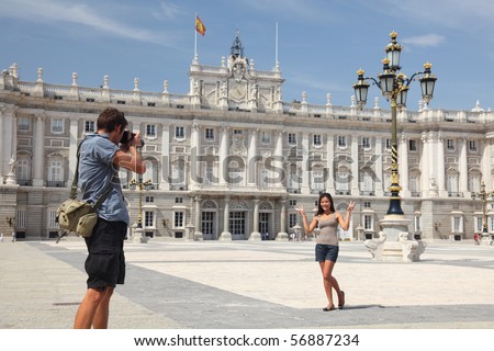 Royal Palace Madrid. Tourists taking pictures by the Palacio de Oriente - the Royal Palace of Madrid.