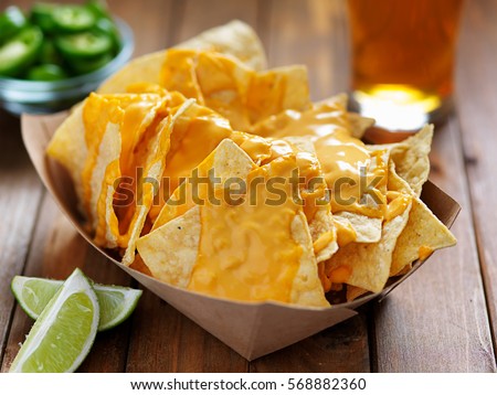 nachos and cheese with lime shot with selective focus Royalty-Free Stock Photo #568882360
