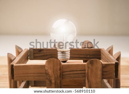 New ideas concept for success. Business ideas for growing light bulb outstanding from other. Innovation,Leadership concept.