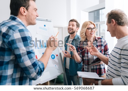 Positive delighted people being involved in the discussion Royalty-Free Stock Photo #569068687