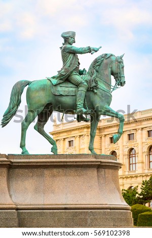 man on horse statue and nice old house in Vienna, Austria