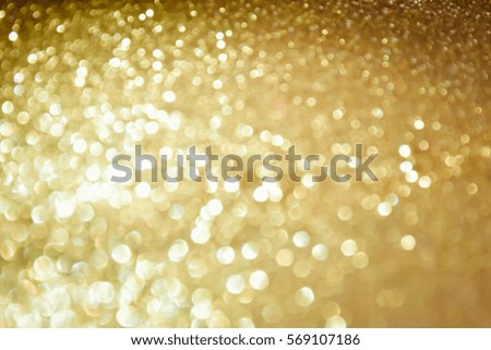 glitter vintage lights background. silver and gold. defocused
