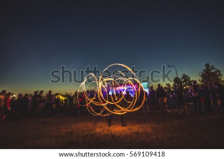 Fire show. Royalty-Free Stock Photo #569109418