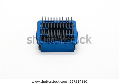 Black aluminum computer heat sink with blue plastic holder, isolated on white background.