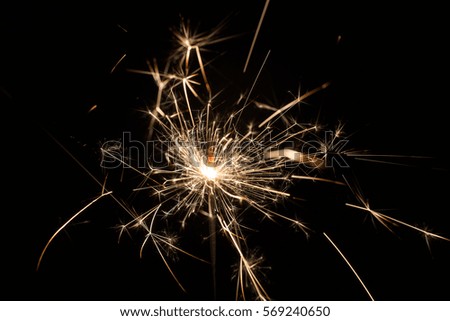 Fire sparklers on black background